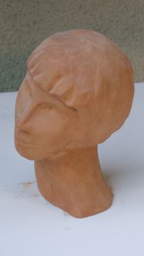 Métisse,terre cuite.25cm.